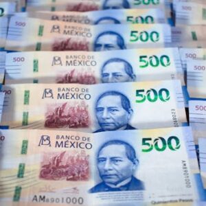 Detail view of multiple Mexican 500 Peso banknotes showcasing currency design and value.